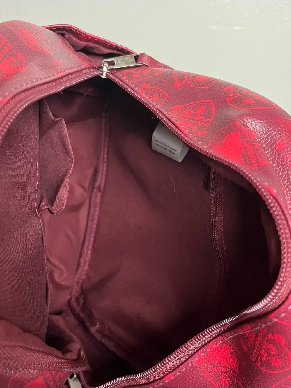 Maroon red faux leather Harry Potter Hogwarts mini backpack ft crest applique